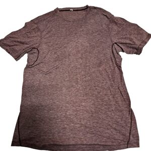 Lululemon T-shirt, men's medium or a womens large, light purple in color
